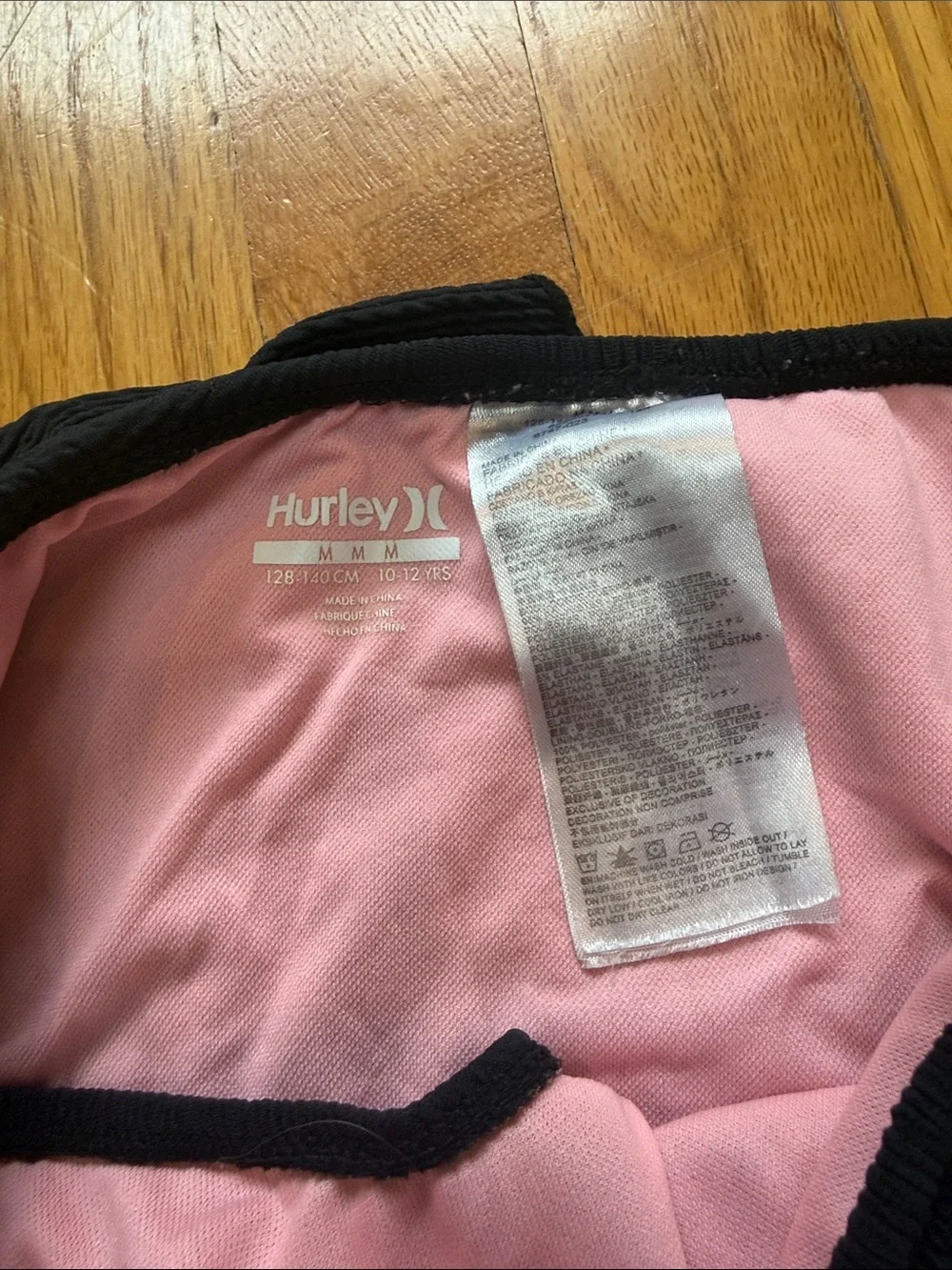 Hurley Black One-Piece Swimsuit with Pink Lining and Ruffle